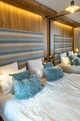 Un ou plusieurs lits dans un hébergement de l'établissement Résidence Alpina Lodge
