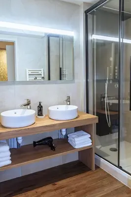 Salle de bains dans l'établissement Résidence Alpina Lodge