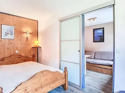 Un ou plusieurs lits dans un hébergement de l'établissement Apartment Les Chaudes Almes by Interhome
