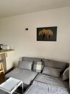 Coin salon dans l'établissement ARC 2000, Studio rénové 4 couchages, Vue Montagne
