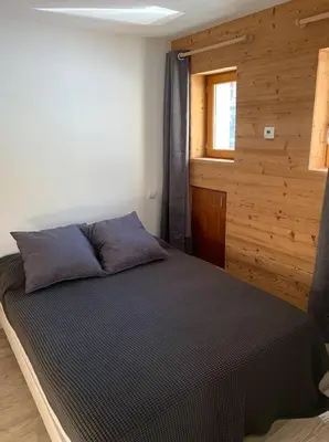 Un ou plusieurs lits dans un hébergement de l'établissement Chalet l'Igloo