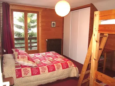 Un ou plusieurs lits dans un hébergement de l'établissement Chalet l'Igloo - 14 personnes