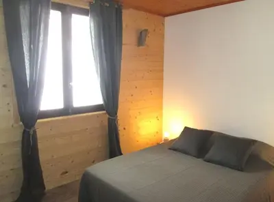 Un ou plusieurs lits dans un hébergement de l'établissement Chalet l'Igloo - 14 personnes