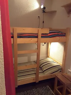 Un ou plusieurs lits dans un hébergement de l'établissement Paradiski ski au pied vallandry