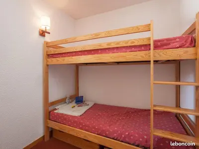 Un ou plusieurs lits dans un hébergement de l'établissement Appartement à la montagne, balcon au soleil