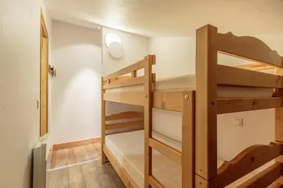 Un ou plusieurs lits superposés dans un hébergement de l'établissement Appartement en résidence Belle Plagne Savoie