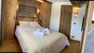 Un ou plusieurs lits dans un hébergement de l'établissement Chalet Les Martin's 2