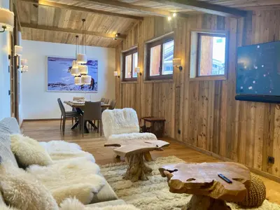 Télévision ou salle de divertissement dans l'établissement Chalet Les Martin's 2