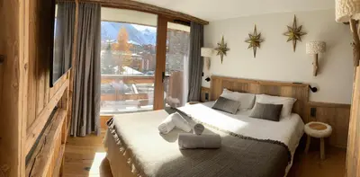 Un ou plusieurs lits dans un hébergement de l'établissement Chalet Les Martin's 2