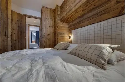 Un ou plusieurs lits dans un hébergement de l'établissement Appartement T3 - ski aux pieds - cœur de station
