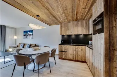 Télévision ou salle de divertissement dans l'établissement Appartement T3 - ski aux pieds - cœur de station
