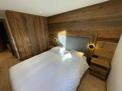 Un ou plusieurs lits dans un hébergement de l'établissement Appartement T3 - ski aux pieds - cœur de station