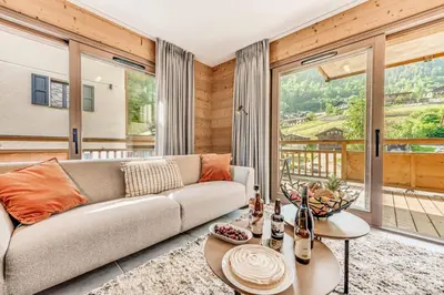 Coin salon dans l'établissement Résidence Les Terrasses De La Vanoise - 3 Pièces pour 4 Personnes MAE-5923