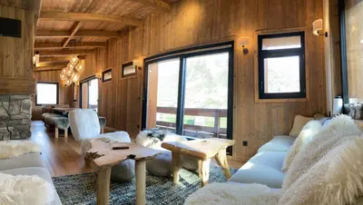 Coin salon dans l'établissement Chalet Les Martin's 4