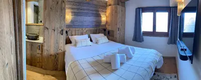 Un ou plusieurs lits dans un hébergement de l'établissement Chalet Les Martin's 4