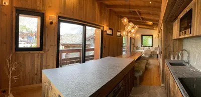 Coin salon dans l'établissement Chalet Les Martin's 4