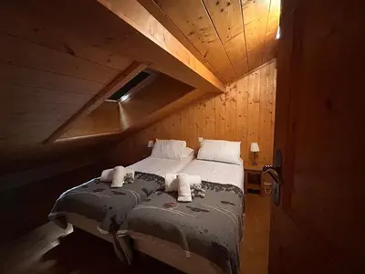 Un ou plusieurs lits dans un hébergement de l'établissement Appartement 9 personnes avec parking à Tignes Val Claret - FR-1-641-119