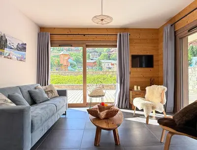 Coin salon dans l'établissement Pierra néva, Terrasse et confort 4 étoiles