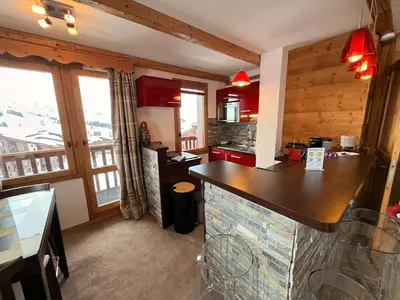 Cuisine ou kitchenette dans l'établissement Appartement Ski aux pieds 3 ch balcon vue pistes et place parking