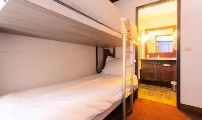 Un ou plusieurs lits dans un hébergement de l'établissement Résidence Les Arcs 1950 Le Village - maeva Home - Appartement 3 pièces 8 personnes - Prestige MAE-0323