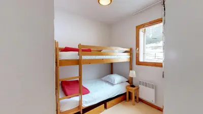 Un ou plusieurs lits dans un hébergement de l'établissement Balcons B 007 - PARC NAT VANOISE appart 6 pers