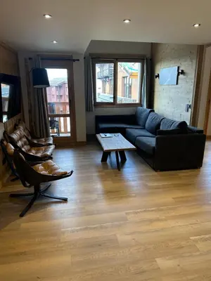 Coin salon dans l'établissement Spacieux appt BELLE PLAGNE 6-8 pers SAUNA