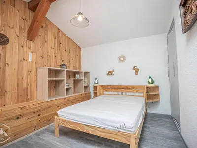 Un ou plusieurs lits dans un hébergement de l'établissement Confort 3 Pièces avec Mezzanine, 6 Pers., Balcon, Parking, Wi-Fi - FR-1-840-2