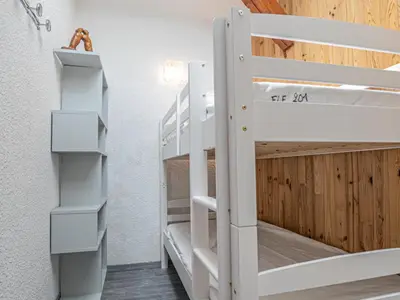 Un ou plusieurs lits dans un hébergement de l'établissement Confort 3 Pièces avec Mezzanine, 6 Pers., Balcon, Parking, Wi-Fi - FR-1-840-2