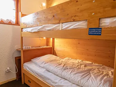 Un ou plusieurs lits dans un hébergement de l'établissement Appartement avec terrasse ensoleillée, animaux admis, parking inclus - FR-1-840-4