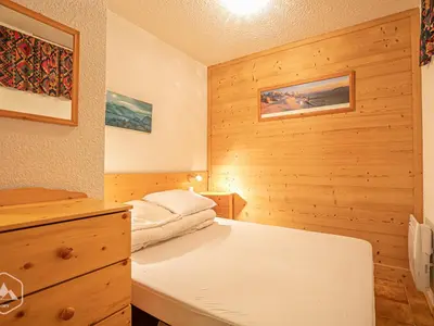 Un ou plusieurs lits dans un hébergement de l'établissement Appartement avec terrasse ensoleillée, animaux admis, parking inclus - FR-1-840-4