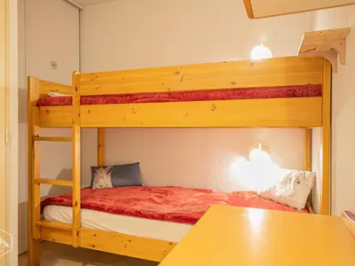 Un ou plusieurs lits dans un hébergement de l'établissement Appartement duplex 6 pers, terrasse, connectivité, parking - FR-1-840-22