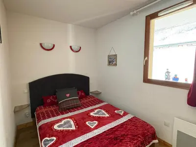 Un ou plusieurs lits dans un hébergement de l'établissement Appartement duplex 6 pers, terrasse, connectivité, parking - FR-1-840-22