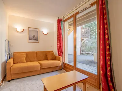 Coin salon dans l'établissement Appartement cosy au pied des pistes avec animaux admis - FR-1-840-27