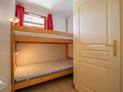Un ou plusieurs lits dans un hébergement de l'établissement Duplex 2 pièces pour 6 pers au pied des pistes, animaux admis - FR-1-840-28