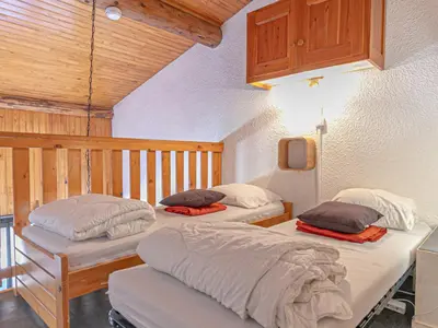 Un ou plusieurs lits dans un hébergement de l'établissement Appartement mezzanine pour 4 pers, proche des remontées - FR-1-840-45