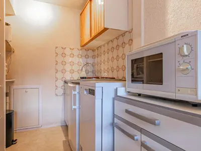 Cuisine ou kitchenette dans l'établissement Appartement mezzanine pour 4 pers, proche des remontées - FR-1-840-45