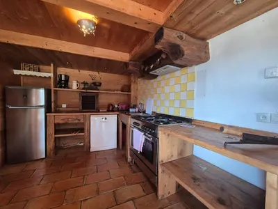 Cuisine ou kitchenette dans l'établissement Charmant Appartement 4 personnes - Montvalezan