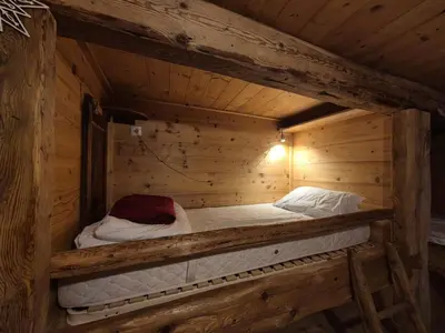 Un ou plusieurs lits dans un hébergement de l'établissement Charmant Appartement 4 personnes - Montvalezan
