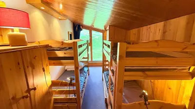 Un ou plusieurs lits superposés dans un hébergement de l'établissement Superbe Duplex Centre Station
