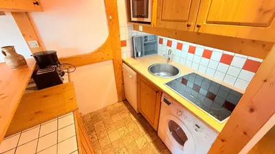Cuisine ou kitchenette dans l'établissement Superbe Duplex Centre Station