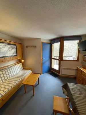 Un ou plusieurs lits dans un hébergement de l'établissement Studio cabine avec coin nuit idéal pour enfants