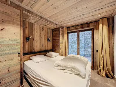 Un ou plusieurs lits dans un hébergement de l'établissement Appartement moderne 3 chambres avec parking à Val d'Isère, 6-7 personnes - FR-1-519-43