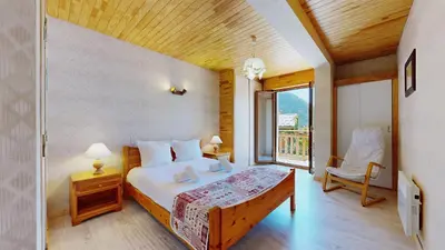 Un ou plusieurs lits dans un hébergement de l'établissement Chalet La Becquetta