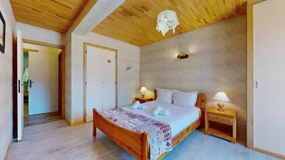 Un ou plusieurs lits dans un hébergement de l'établissement Chalet La Becquetta