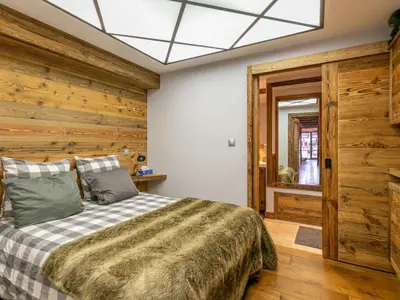 Un ou plusieurs lits dans un hébergement de l'établissement Appartement haut de gamme, au pied des pistes, avec WIFI - FR-1-694-432