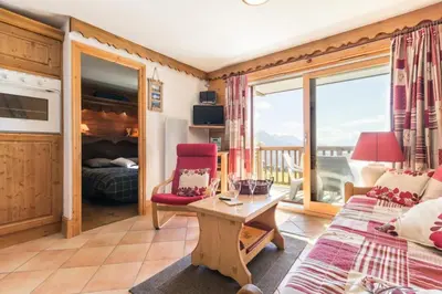 Coin salon dans l'établissement Résidence Alpages Du Chantel - Appartement 3 pièces 6 personnes MAE-5594