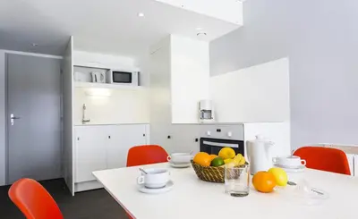 Cuisine ou kitchenette dans l'établissement Résidence Aiguille Rouge - Centre station Appartement 3 pièces 8 personnes MAE-7814