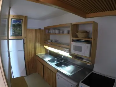 Cuisine ou kitchenette dans l'établissement Résidence Nova 3 - Appartement 2 pièces 7 personnes proche des pistes MAE-7974