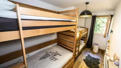 Un ou plusieurs lits superposés dans un hébergement de l'établissement Résidence L'ecrin - Appartement de standing 4 pièces 8 personnes MAE-7943