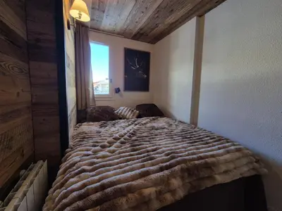 Un ou plusieurs lits dans un hébergement de l'établissement RPP A119 ski au pied appartement 6pers